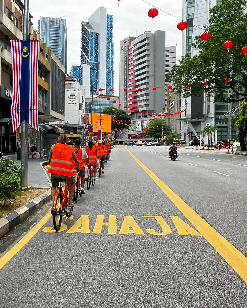 MikeBikes people ride bikes in Kuala Lumpur on a tour in Malaysia