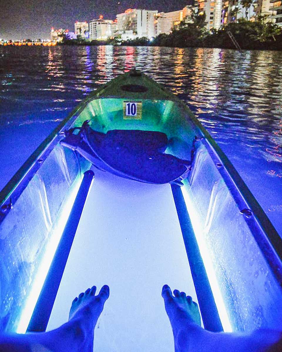 Night Kayak a person sits in a kayak on a tour in San Juan Puerto Rico