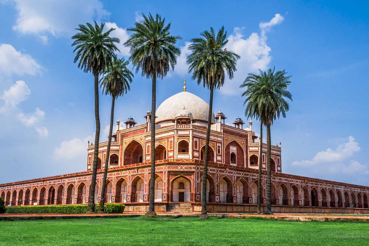 humayun's tomb with palm trees in New Delhi India