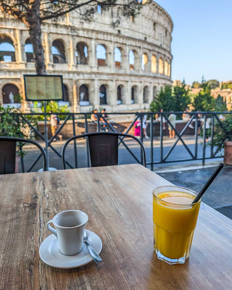A coffee and a juice at La Biga Wine Food with a view of the Colosseum in Rome, Italy