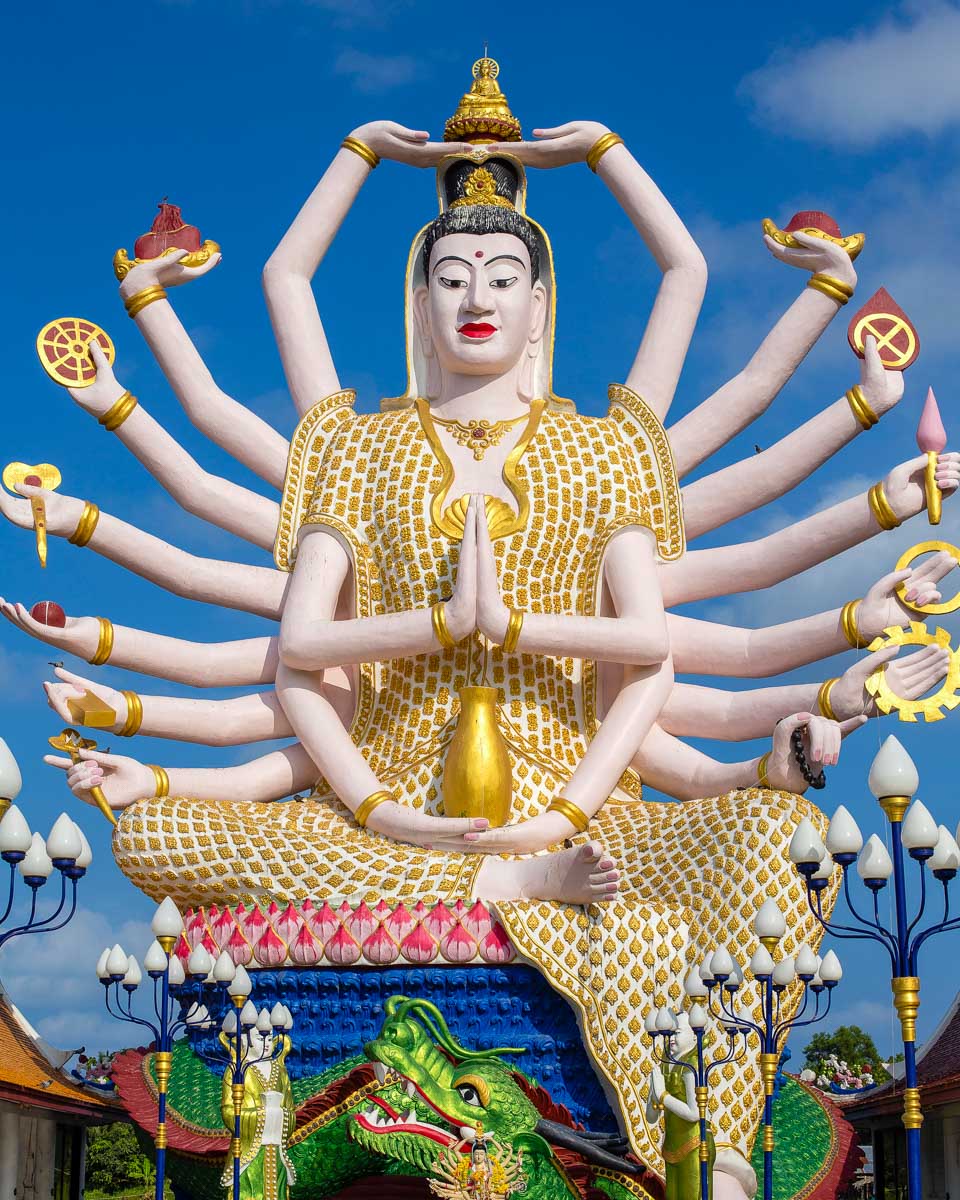 A statue of Shiva at wat plai laem on a tour of Koh Samui Thailand