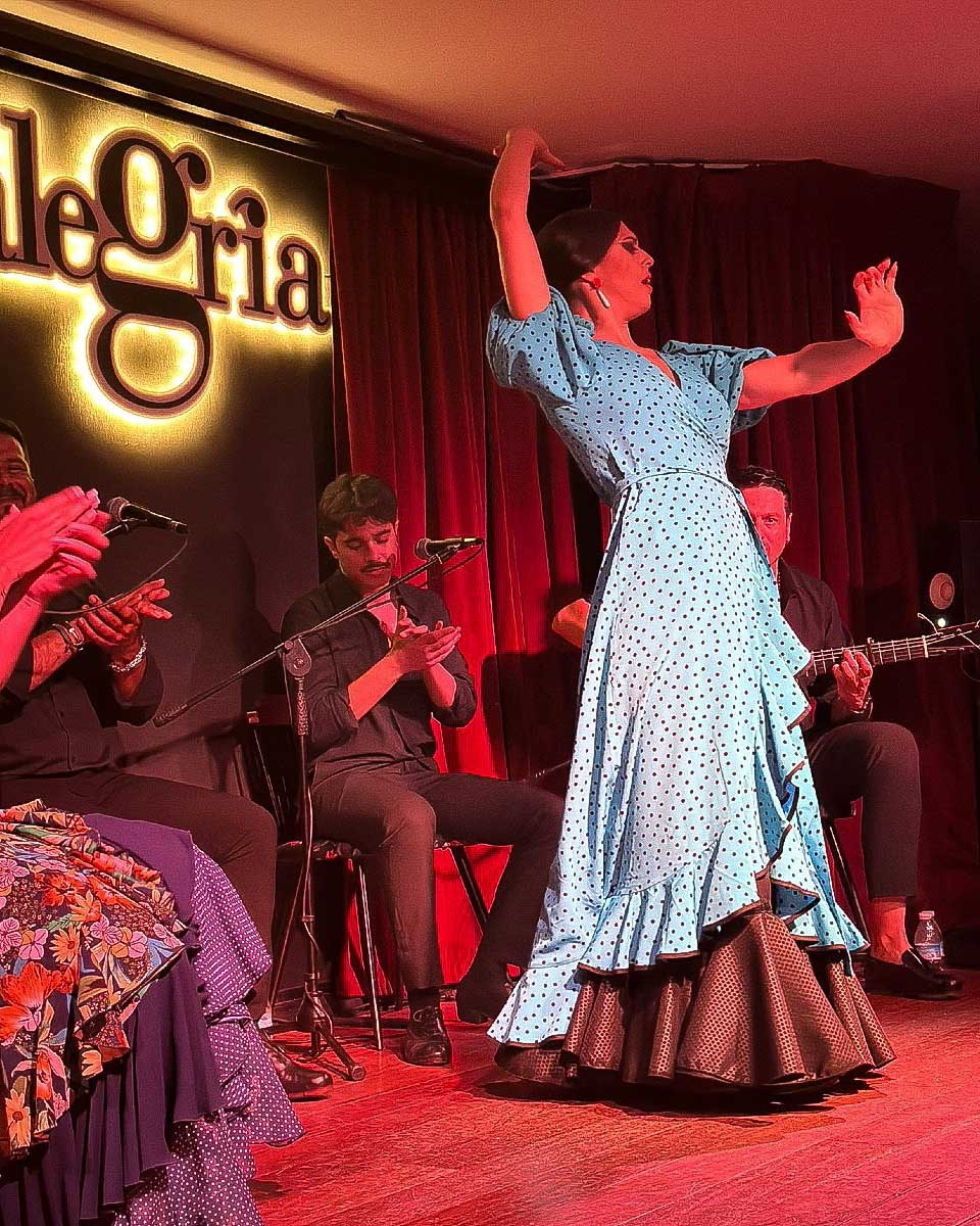 A woman dances flamenco at a show in Malaga, Spain