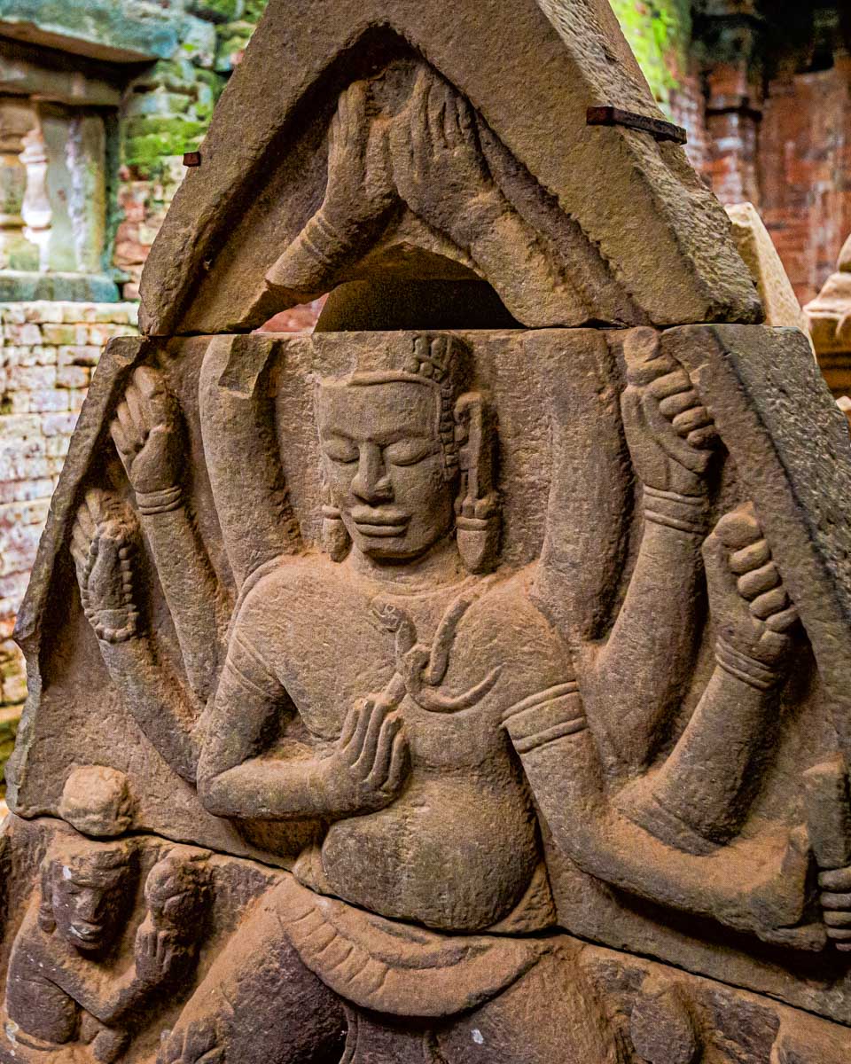 An ancient statue inside My Son Sanctuary seen on a tour from Hoi An Vietnam