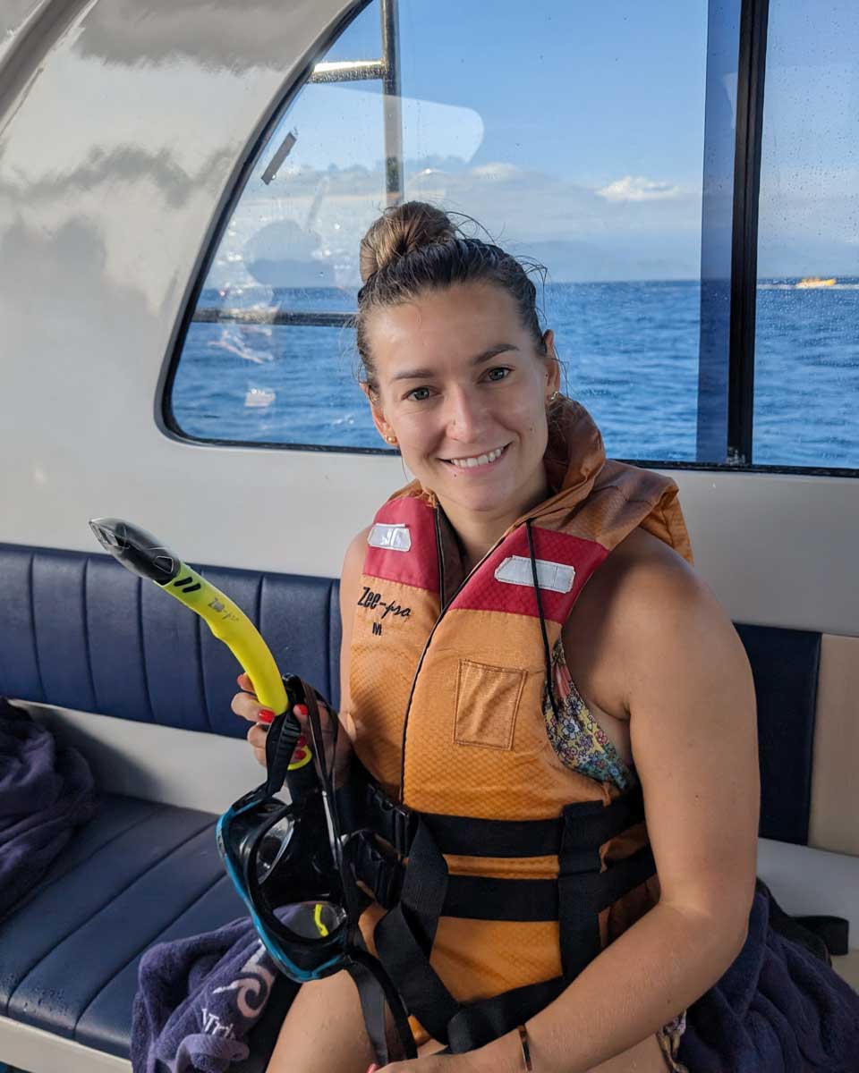 Bailey on a boat to go snorkeling with stingrays in Grand Cayman