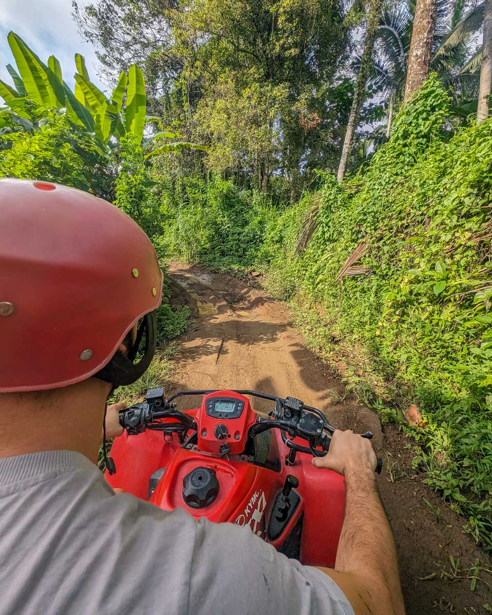 Daniel-and-Bailey-ride-ATV-through-jungle-in-Hoi An Vietnam
