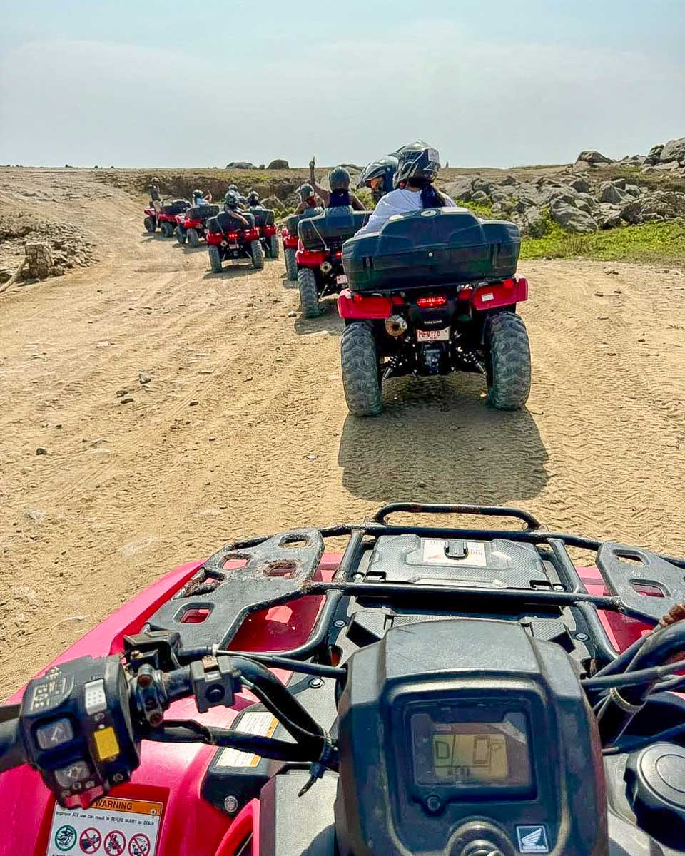 Kini Kini Transfer & Tours people take an atv tour from Oranjestad Aruba