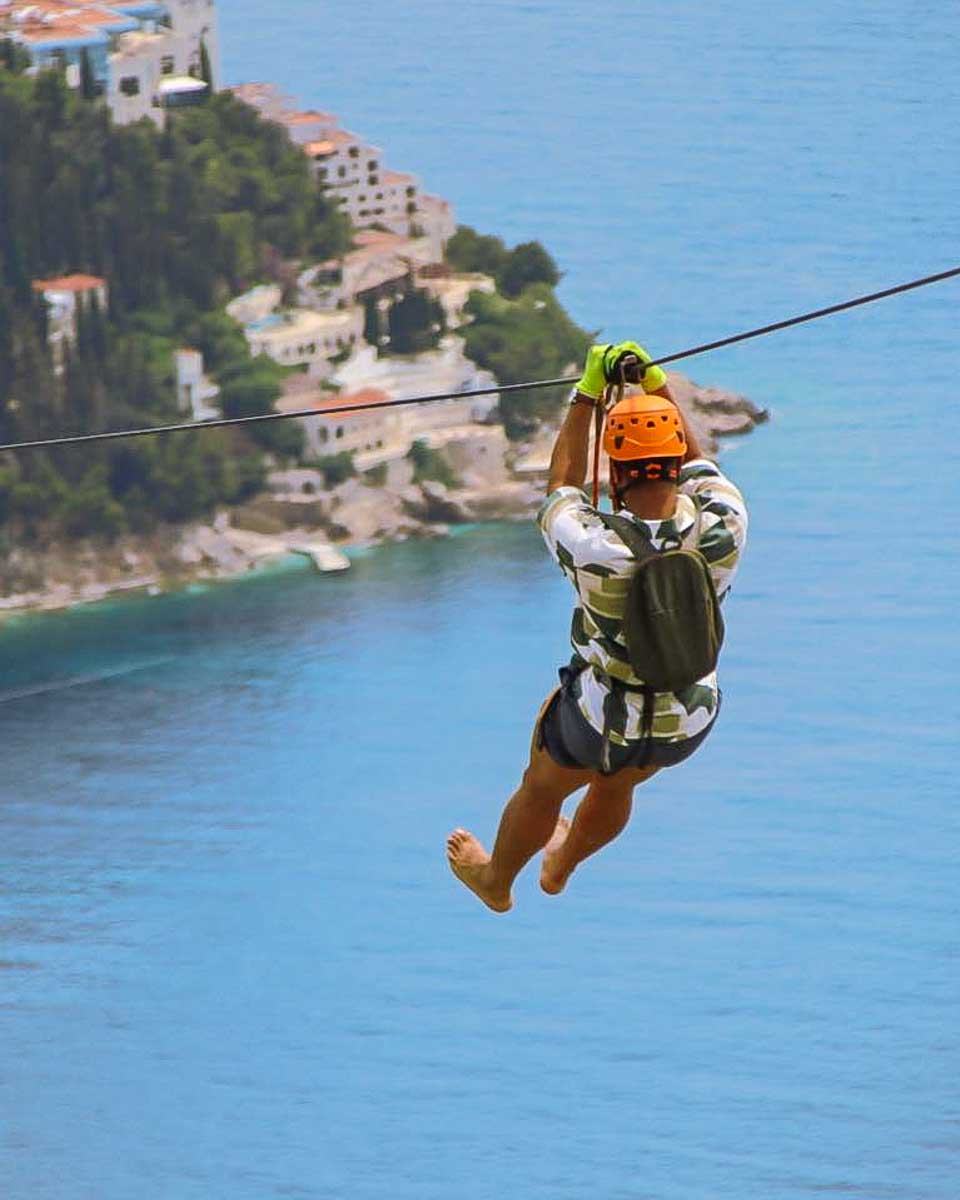 Panorama Zip Line Dubrovnik a person ziplines on a tour in Dubrovnik Croatia