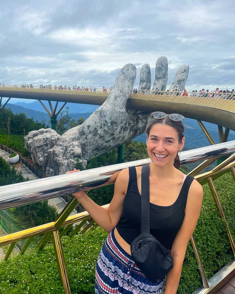 Posing in front of the Golden Hand Bridge at Ba Na Hills Vietnam