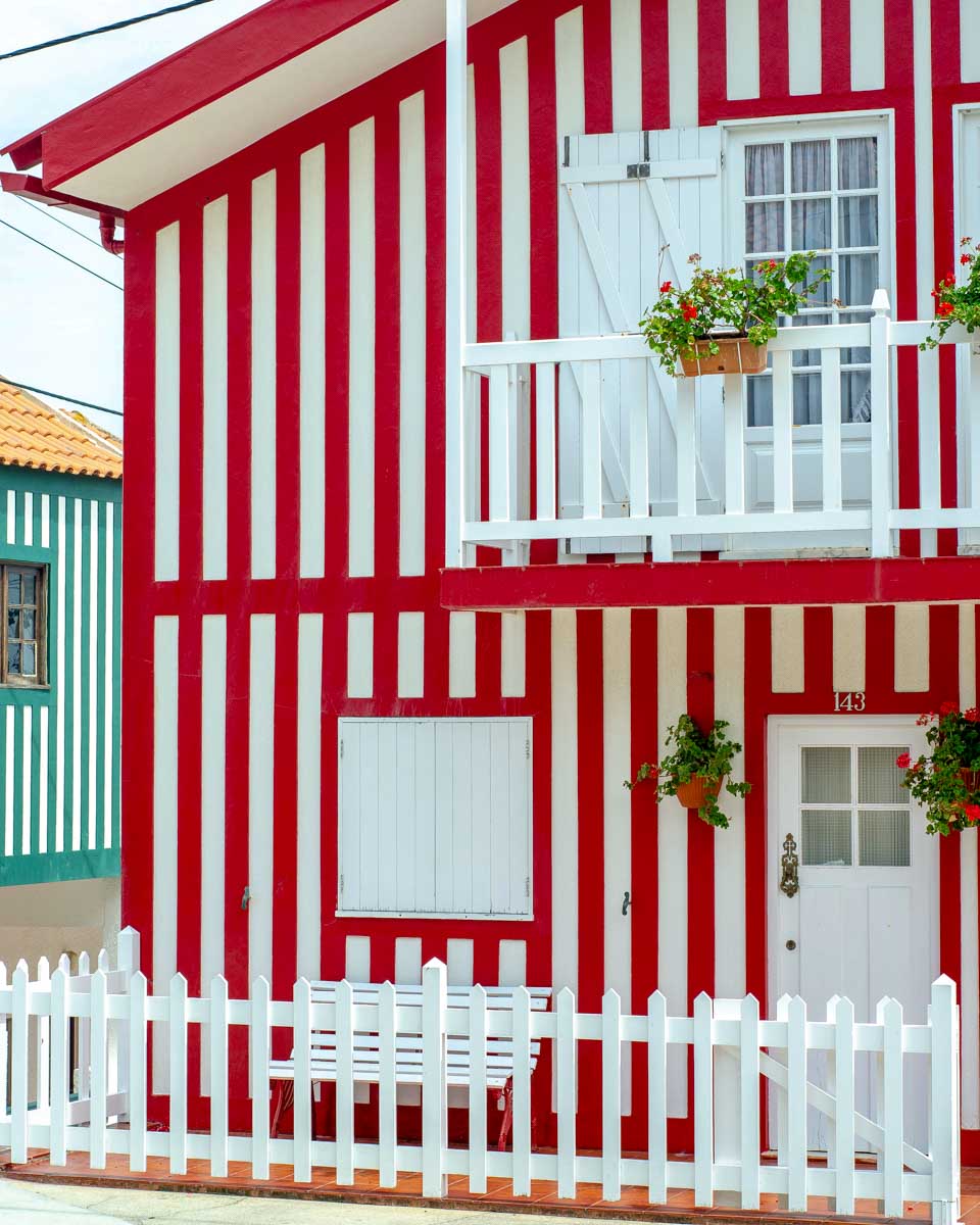 Striped house on Costa Nova Beach on a tour from Porto Portugal