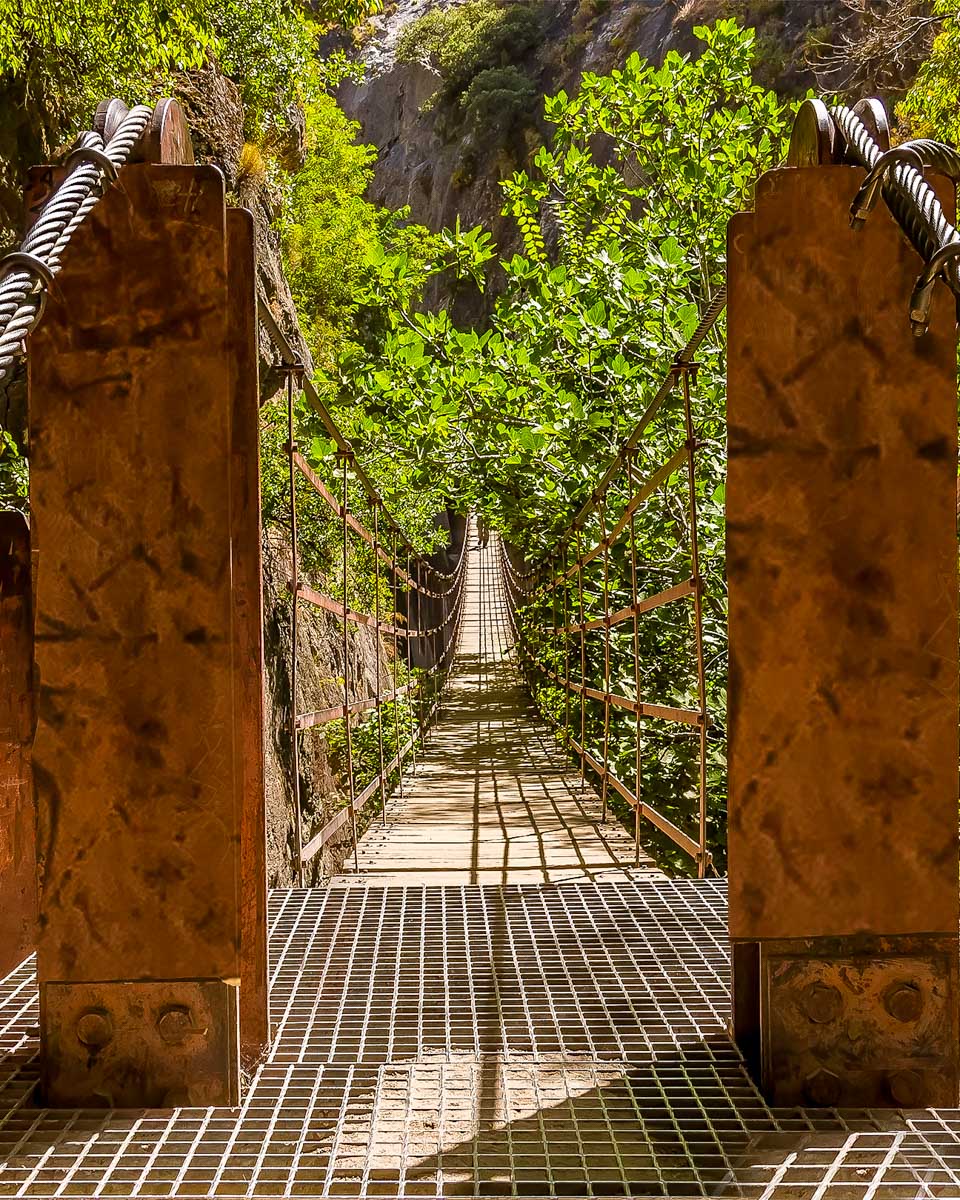 A bridge over a canyon in Monachil on a hiking tour from Granada Spain