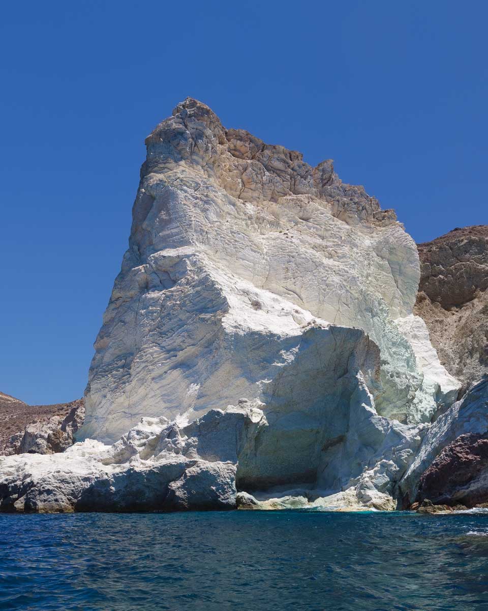 A large white rock seen at White Beach on a catamaran tour in Santorini Greece