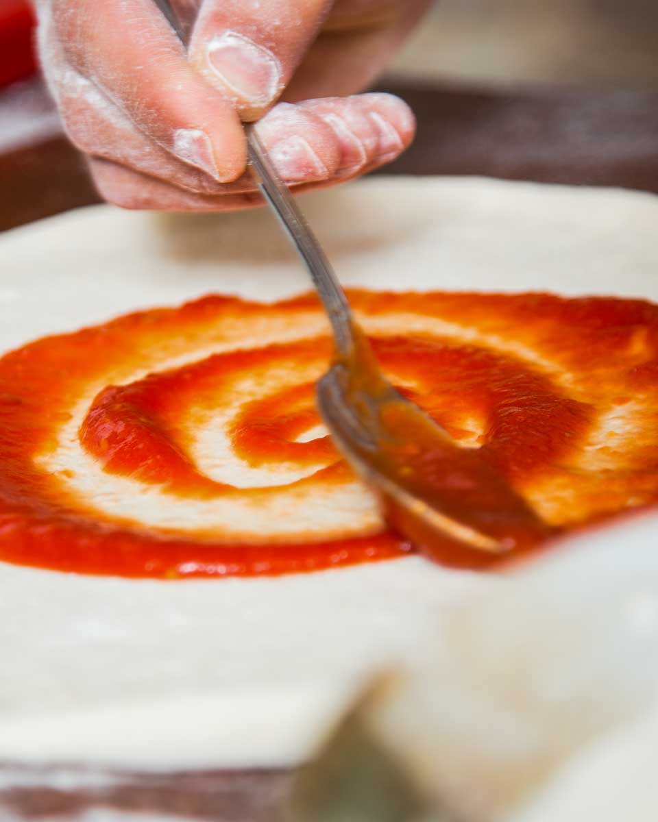A-person-making-pizza-in-Palermo Sicily-Italy