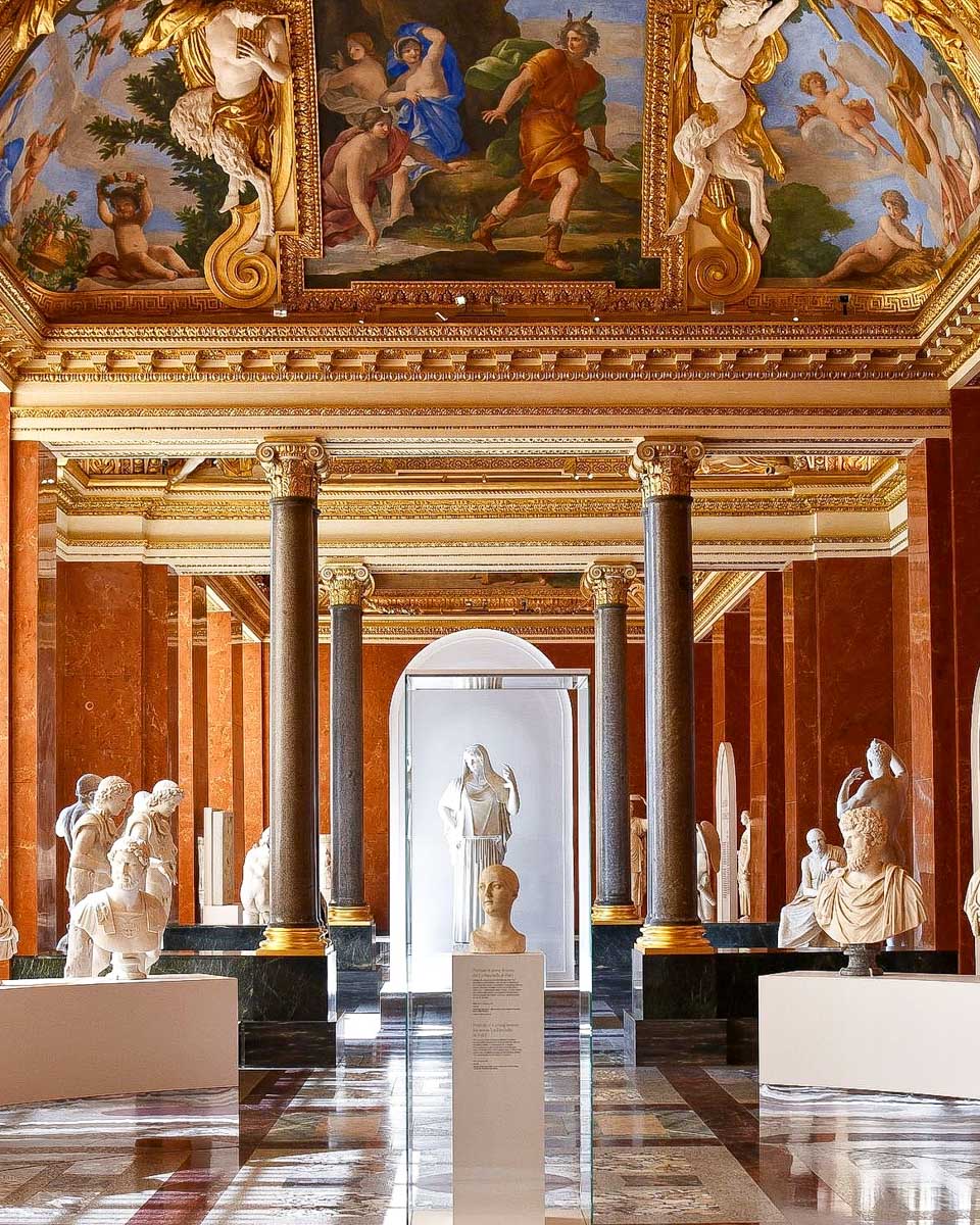 Musée du Louvre sculptures in hallway of the Louvre Paris France