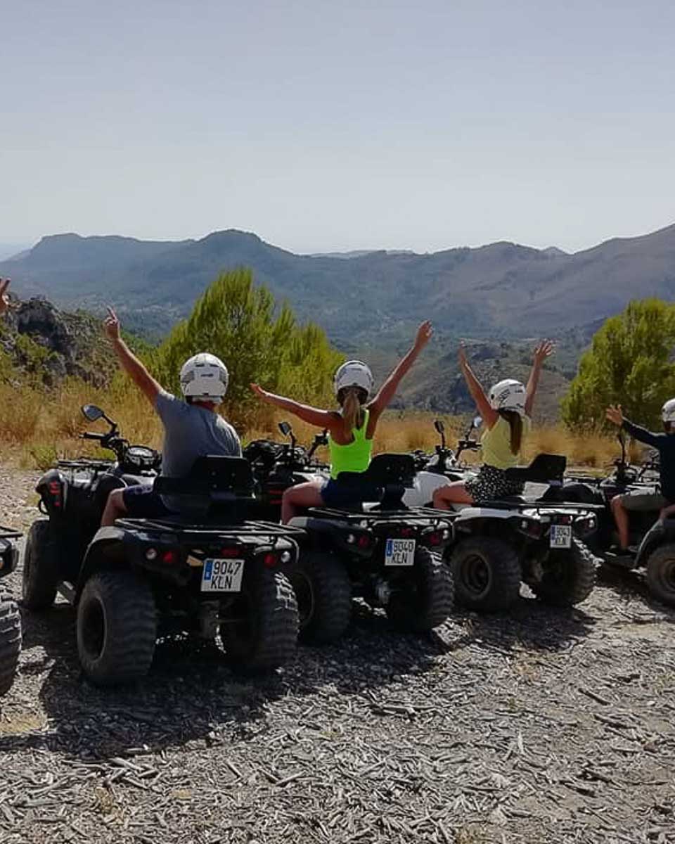 People on ATVs on a tour in Palma de Mallorca Spain