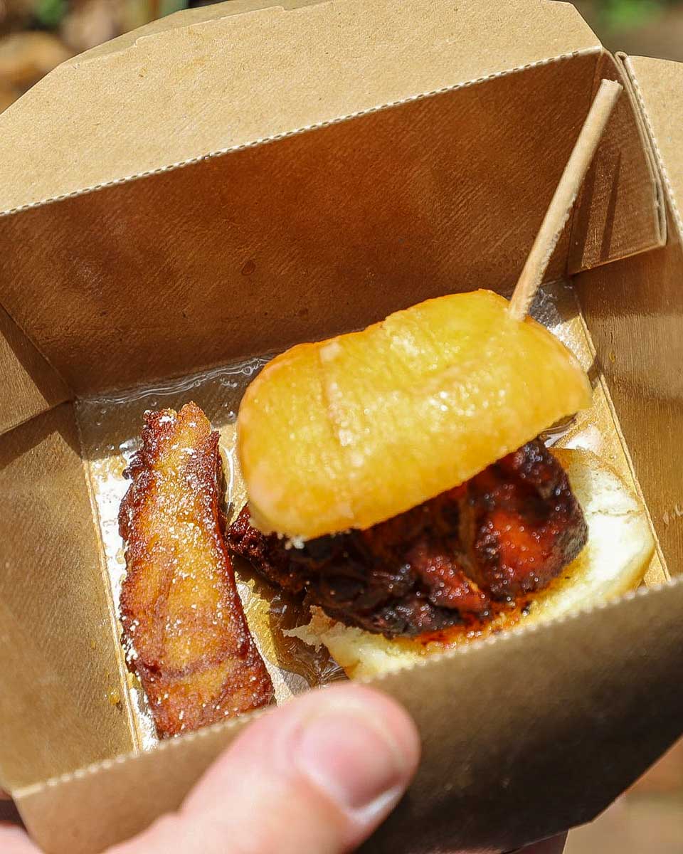 Savannah Taste Experience Food Tours & Marketplace porkbelly donut slider on a food tour in Savannah Georgia