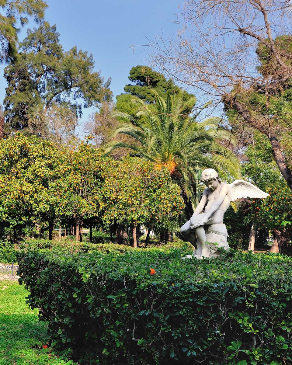 An angel statue in the National Gardens of Athens Greece