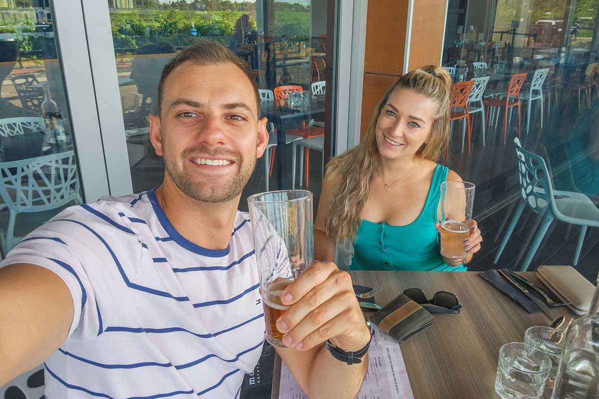 Bailey-and-Daniel-take-a-selfie-drinking-beer-in-Santa Fe New Mexico