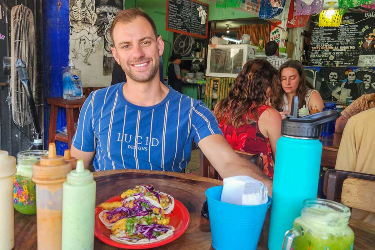 Daniel eats tacos in Los Angeles California United States