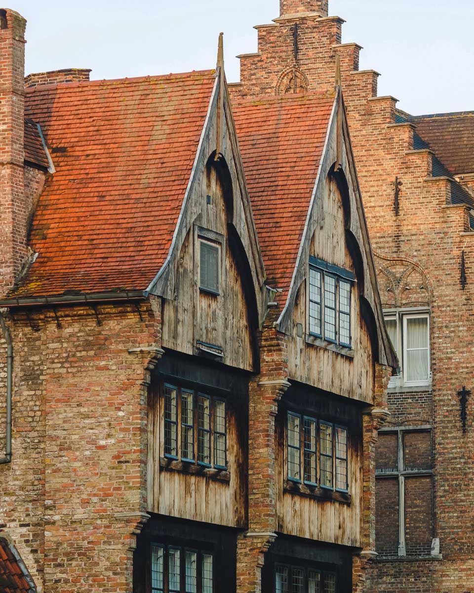 Old houses seen on a historic walking tour in Bruges Belgium