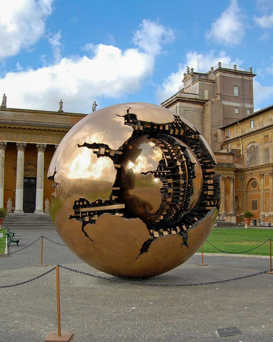 Sculpture of the globe in the vatican museums courtyard Vatican Rome