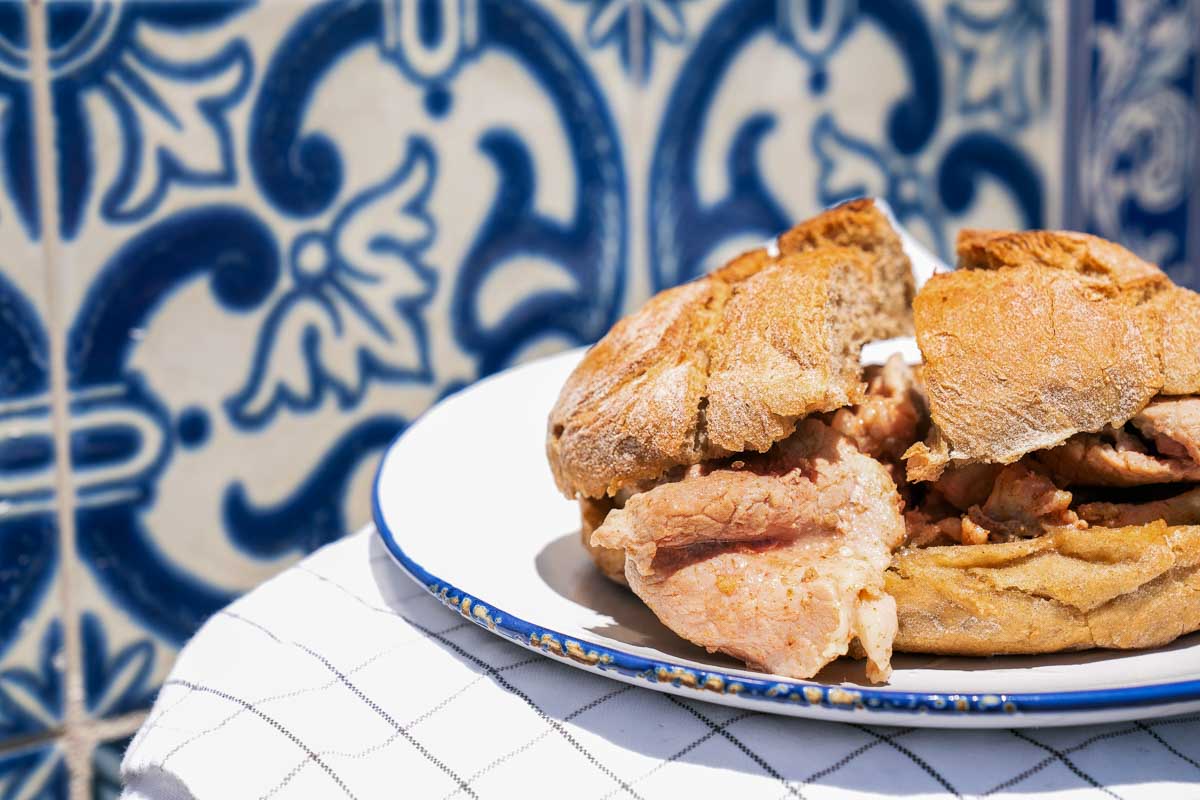 A traditional Portugese sandwich bifanas in Lisbon Portugal