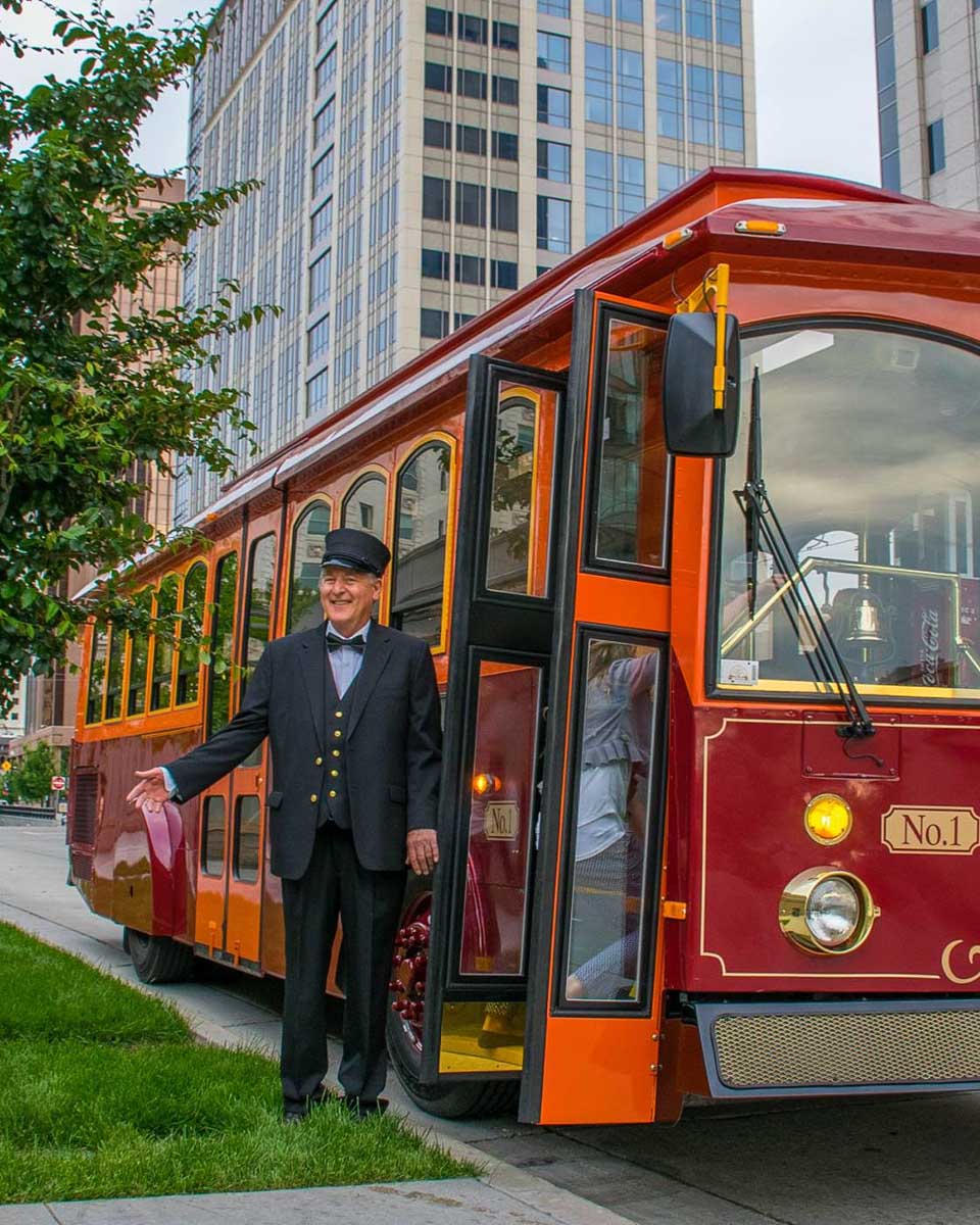 A trolley and conductor on a tour in Salt Lake City Utah