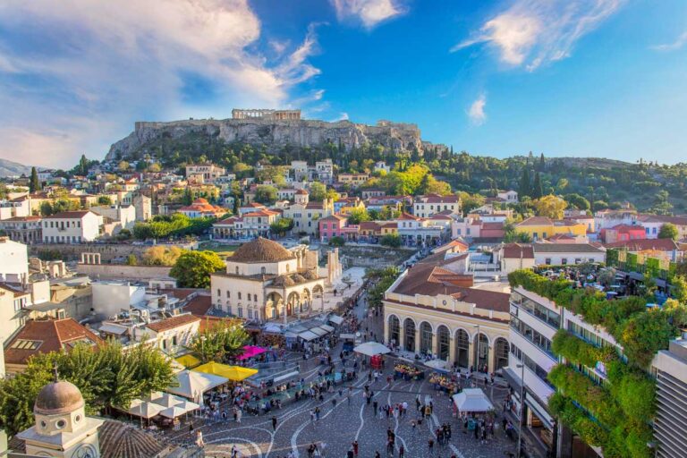 A view of Athens Greece from the sky with Acropolis in the background