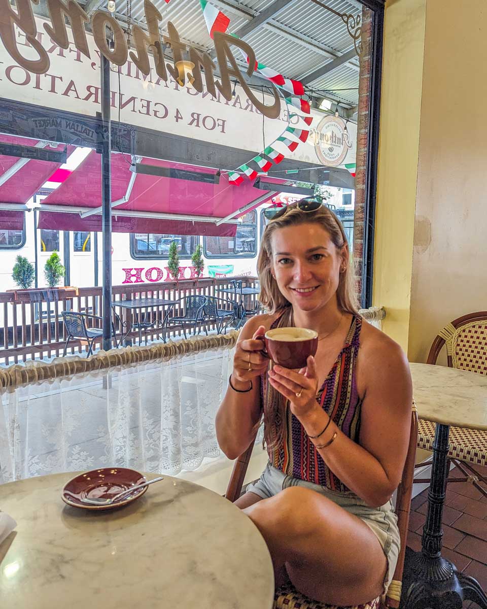 Bailey drinks coffee on a coffee tour in Seattle Washington