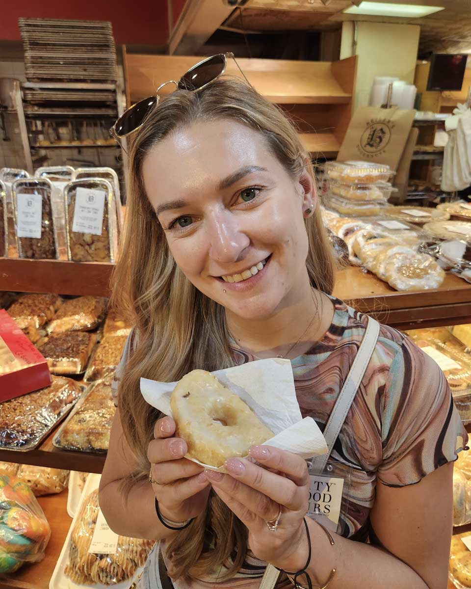 Bailey-eating-a-pastry-in-Milan-Italy