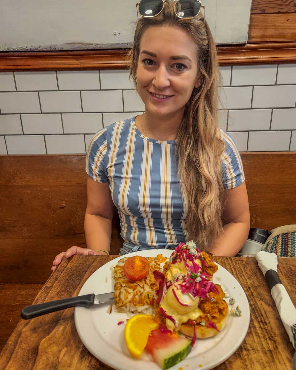 Bailey eats eggs benedict in Madrid Spain