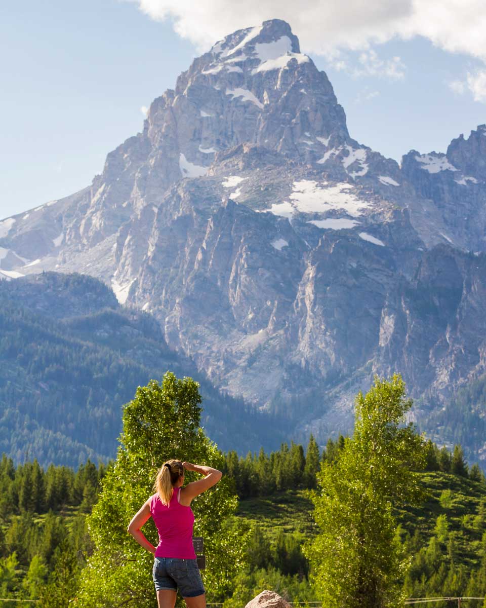 Bailey looks at the Grand Teton mountain range on a tour to the Grand Tetons from Jackson Hole Wyoming
