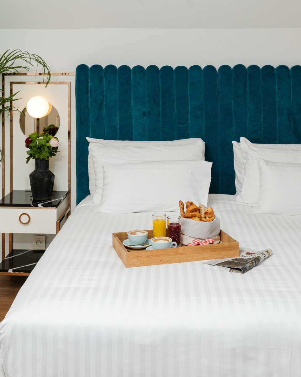 Breakfast on the bed at the hotel maison colbert in paris france