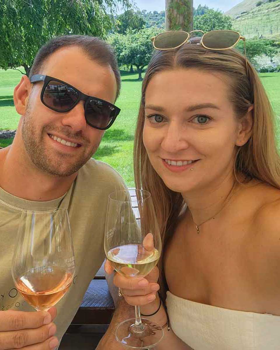 Daniel and Bailey drink wine on a wine tour from Santa Barbara California