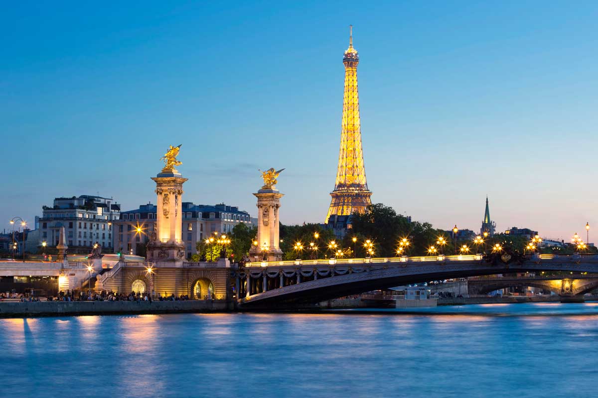 Eiffel Tower Seen at night on a Seine River Cruise