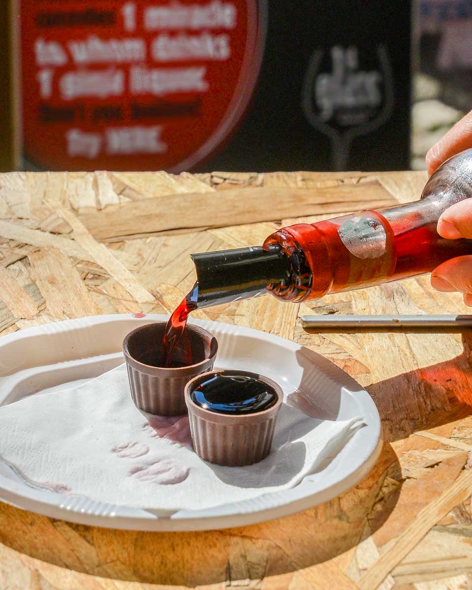 Ginjinha a local cherry liqueur drank on a food tour in Lisbon Portugal