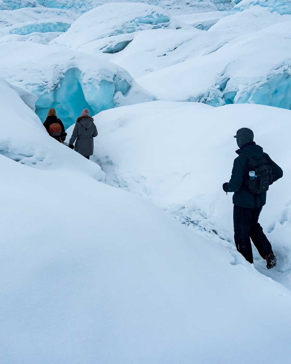 People hike on Matanuska Glacier on a tour from Anchorage Alaska