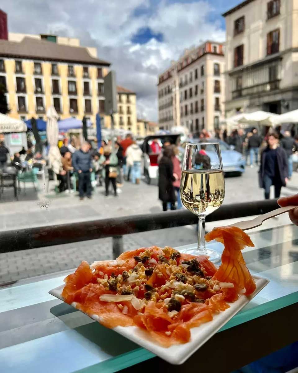 Tapas and wine at the Mercado de San Miguel in Madrid Spain