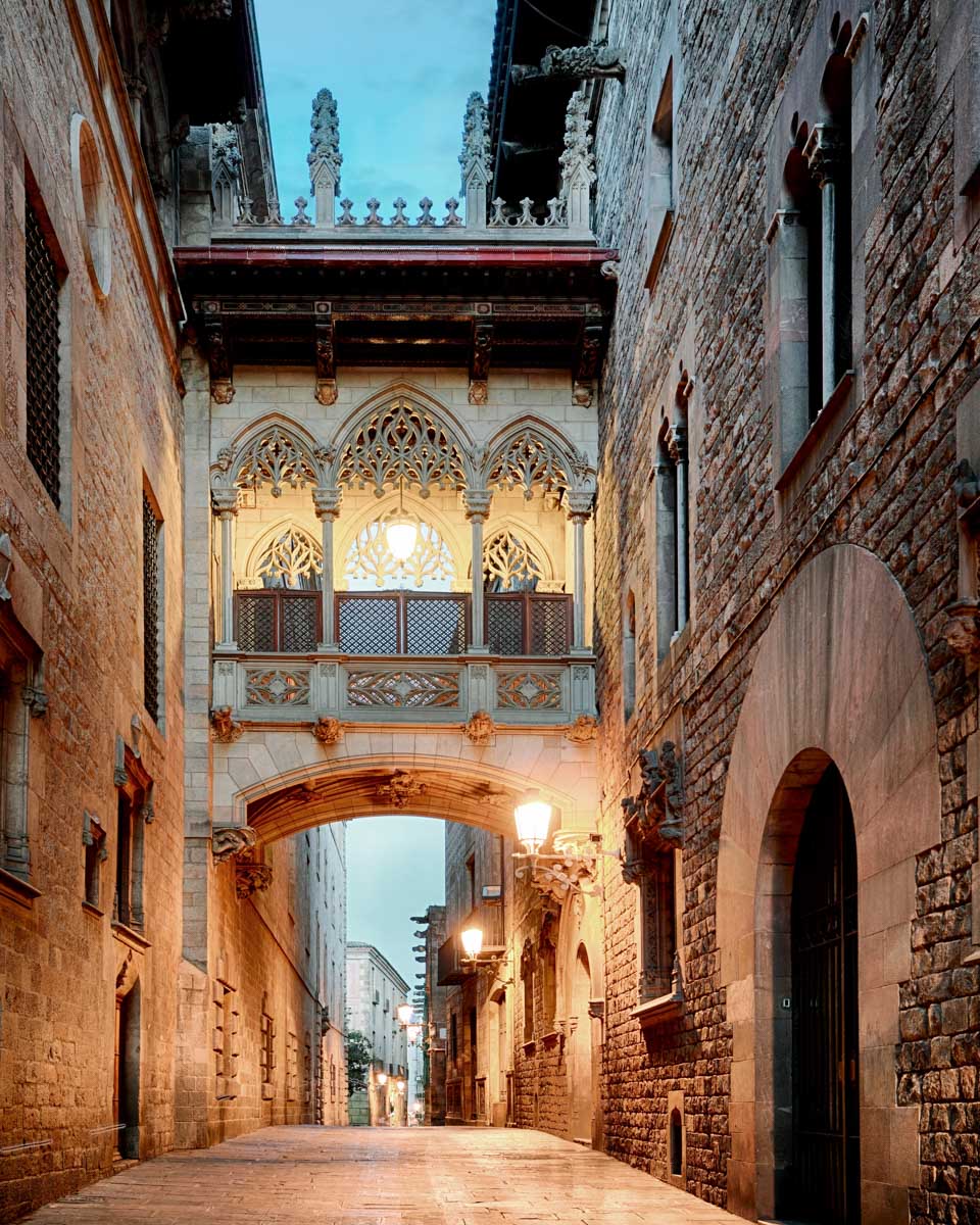The Barri Gothic Quarter and Bridge of Sighs in the evening in Barcelona