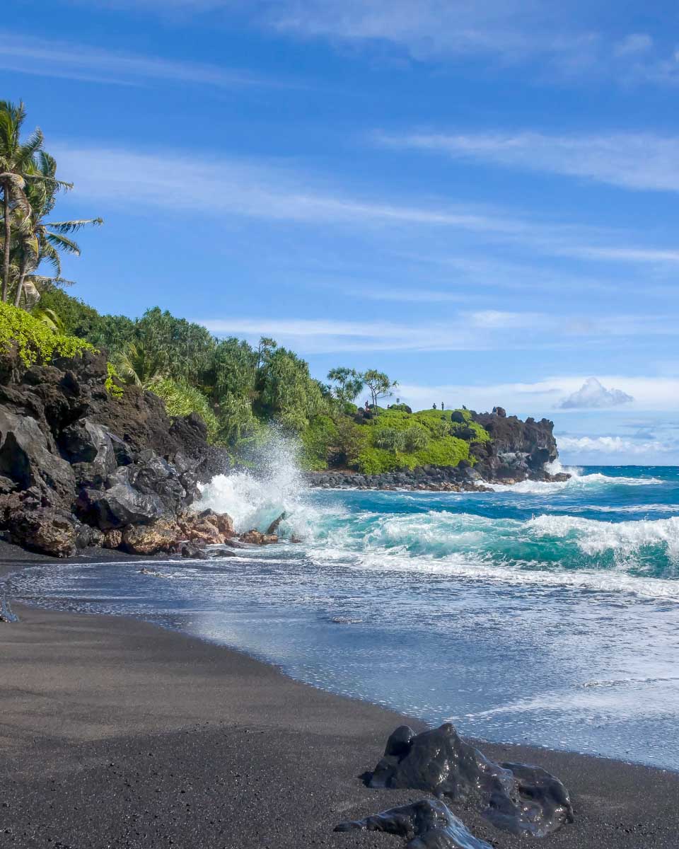 Wai'anapanapa State Park black sand beach seen on a tour from Maui Hawaii