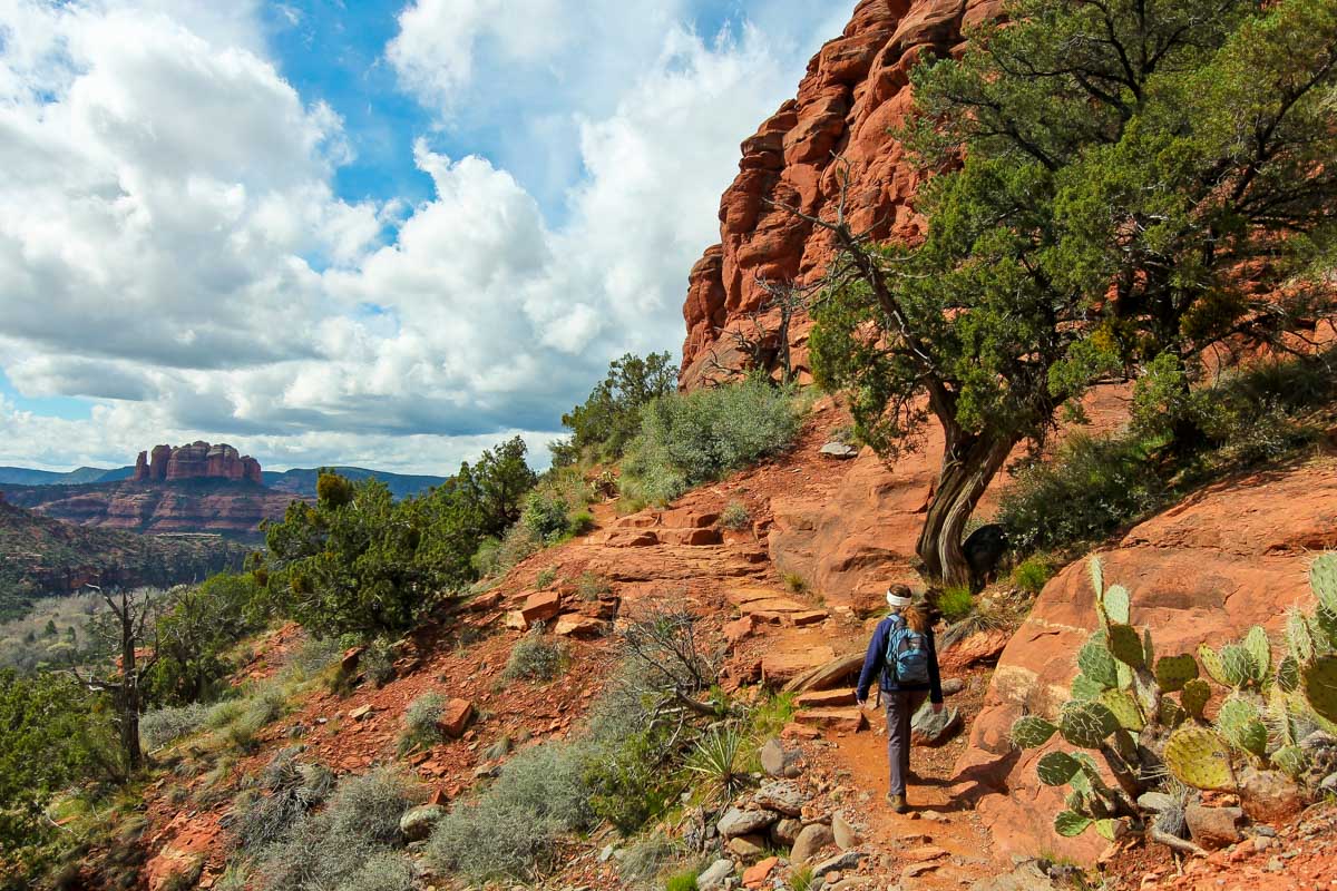 A Woman Hikes the Airport Loop Trail to vortex in Sedona Arizona