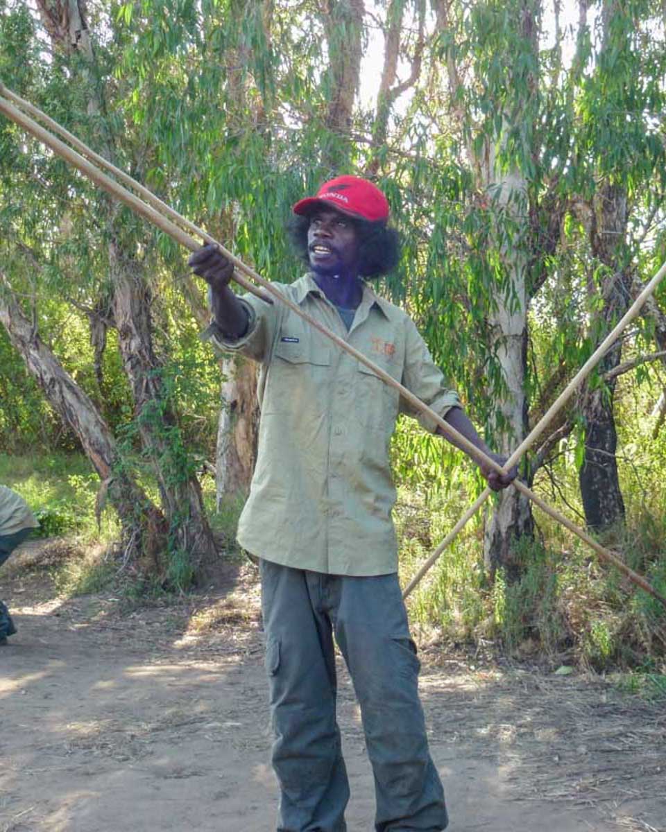 A-local-aboriginal man-shows-how-to-hunt on a tour from Darwin Australia