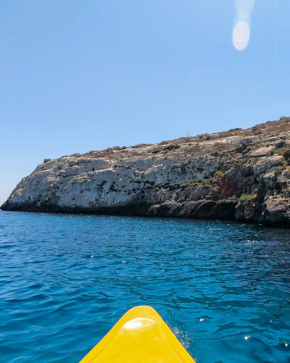 A person kayaks while-kayaking-on-a-tour-of Cinque Terre Italy