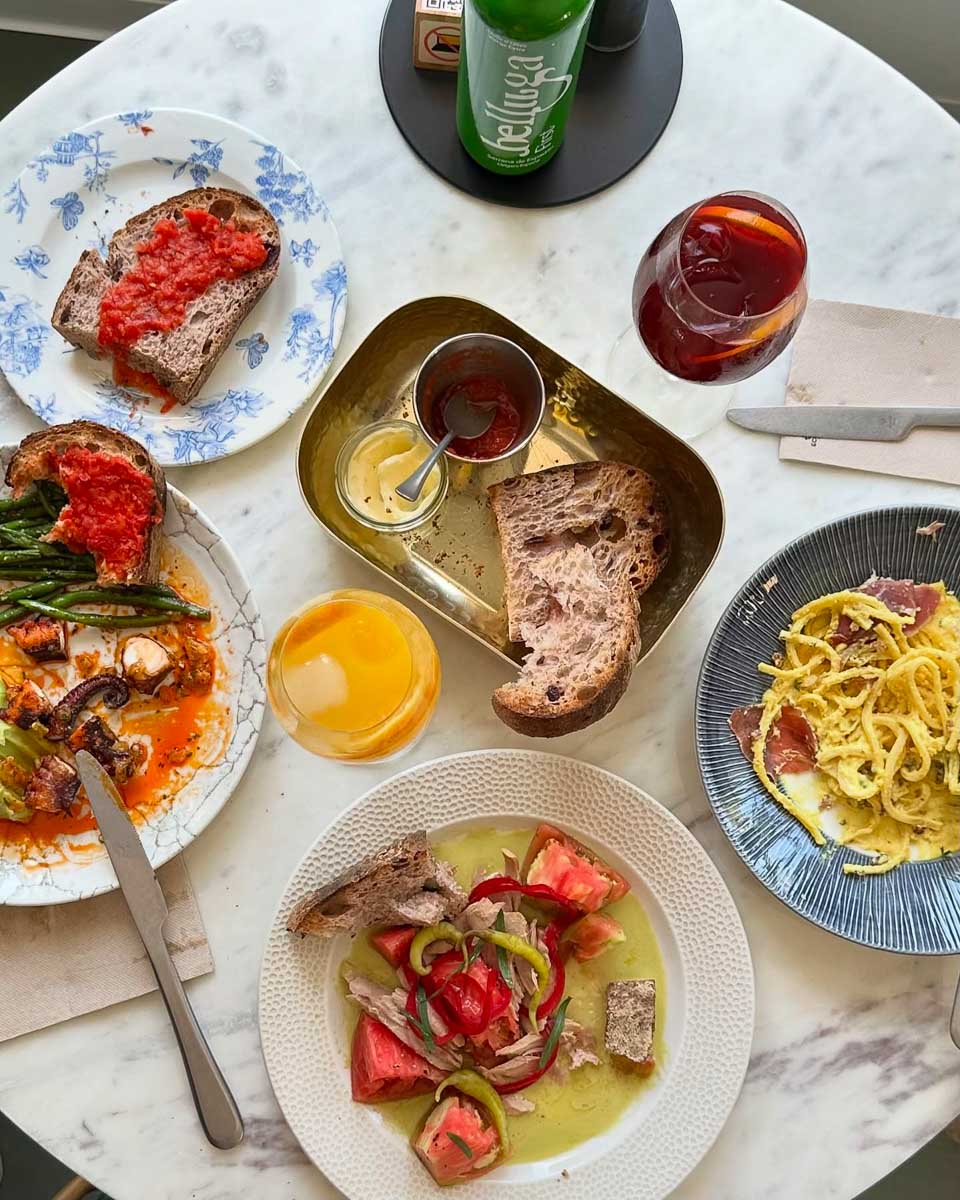 A table full of food at Pasqual + Sheila in Valencia Spain
