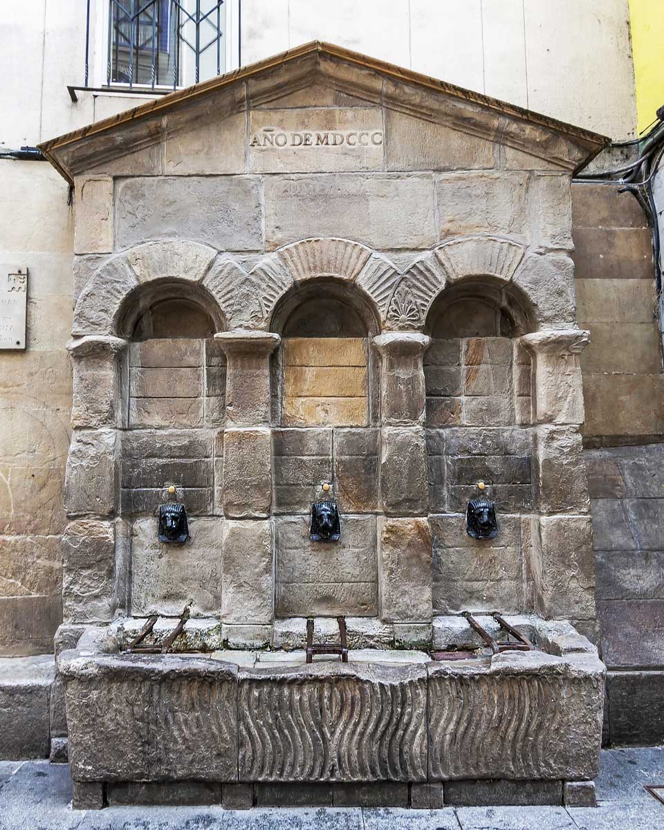 An old fountain from the 1800s in Casco Viejo Bilbao Spain