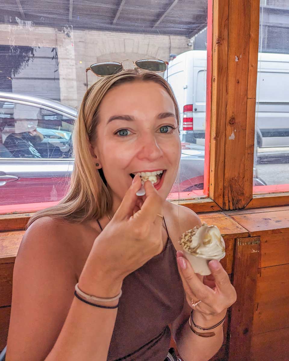 Bailey-eats-gelato-in-San Gimignano on a tour of Tuscany from Florence Italy