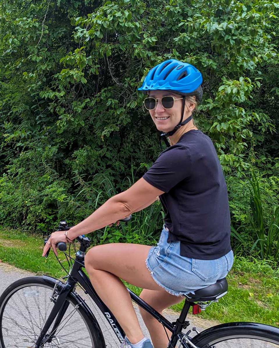 Bailey-rides-a-bike-on-a-wine and biking tour in Napa California