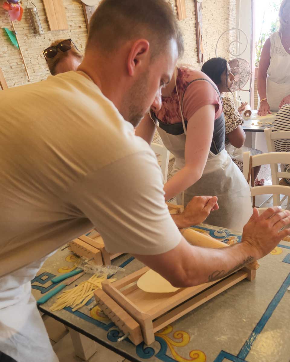 Daniel making pasta during a cooking class in Riomaggiore Cinque Terre Italy