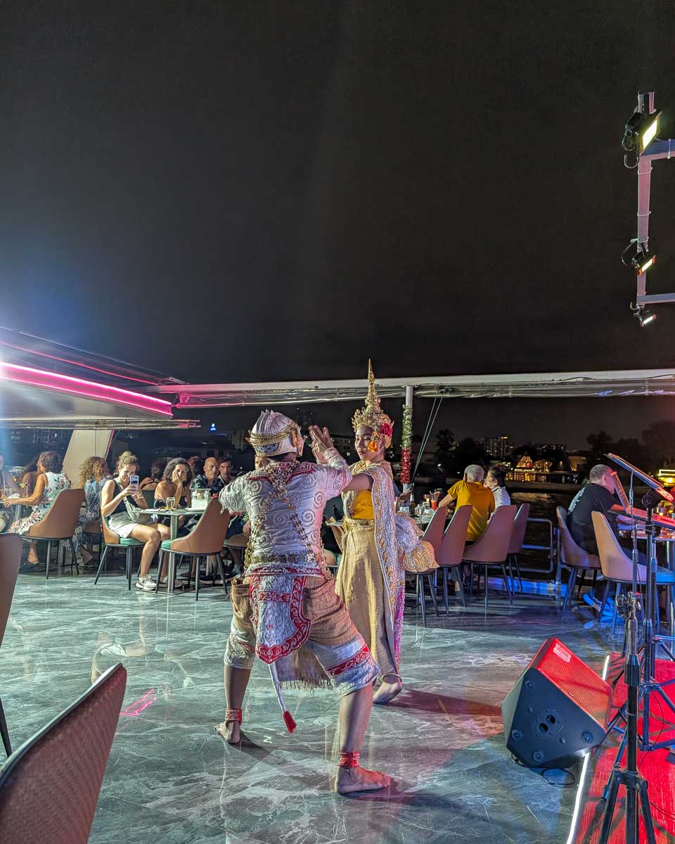 People perform on a night cruise in Bangkok Thailand