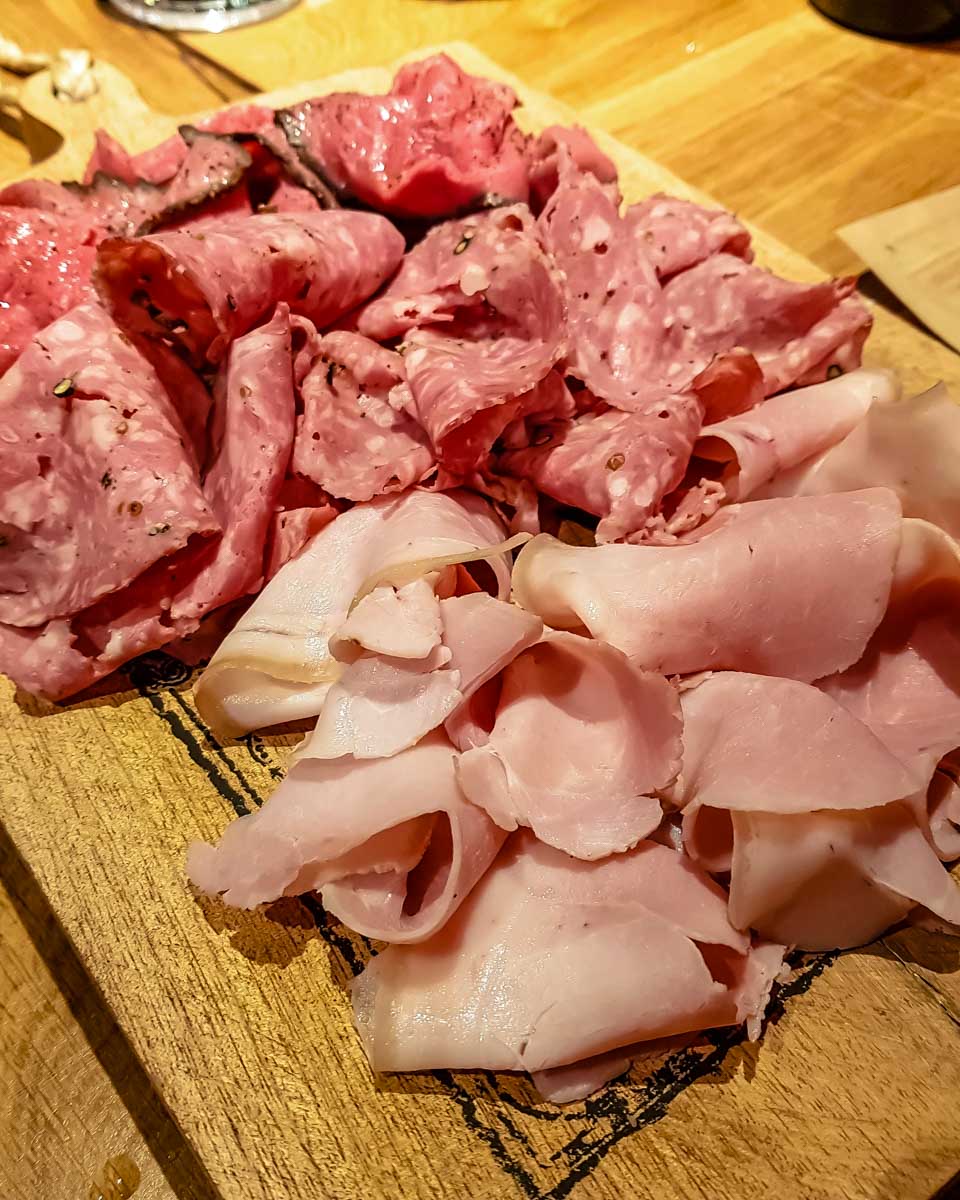 Smoked meats eaten on a food tour of Helsinki Finland