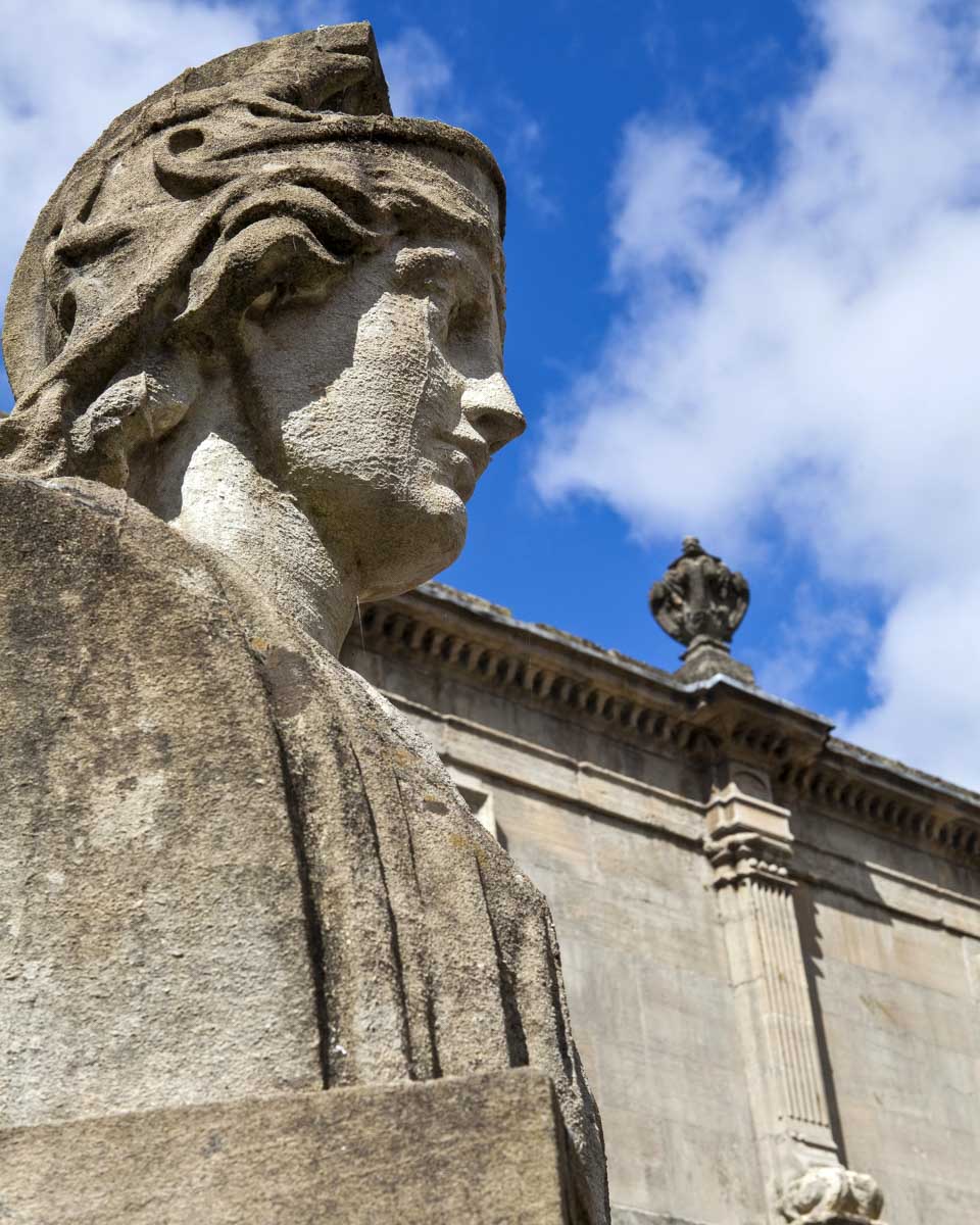 Statues at the Roman Baths seen on a tour to Windsor Castle from London England
